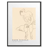 Seated Woman in Corset and Boots